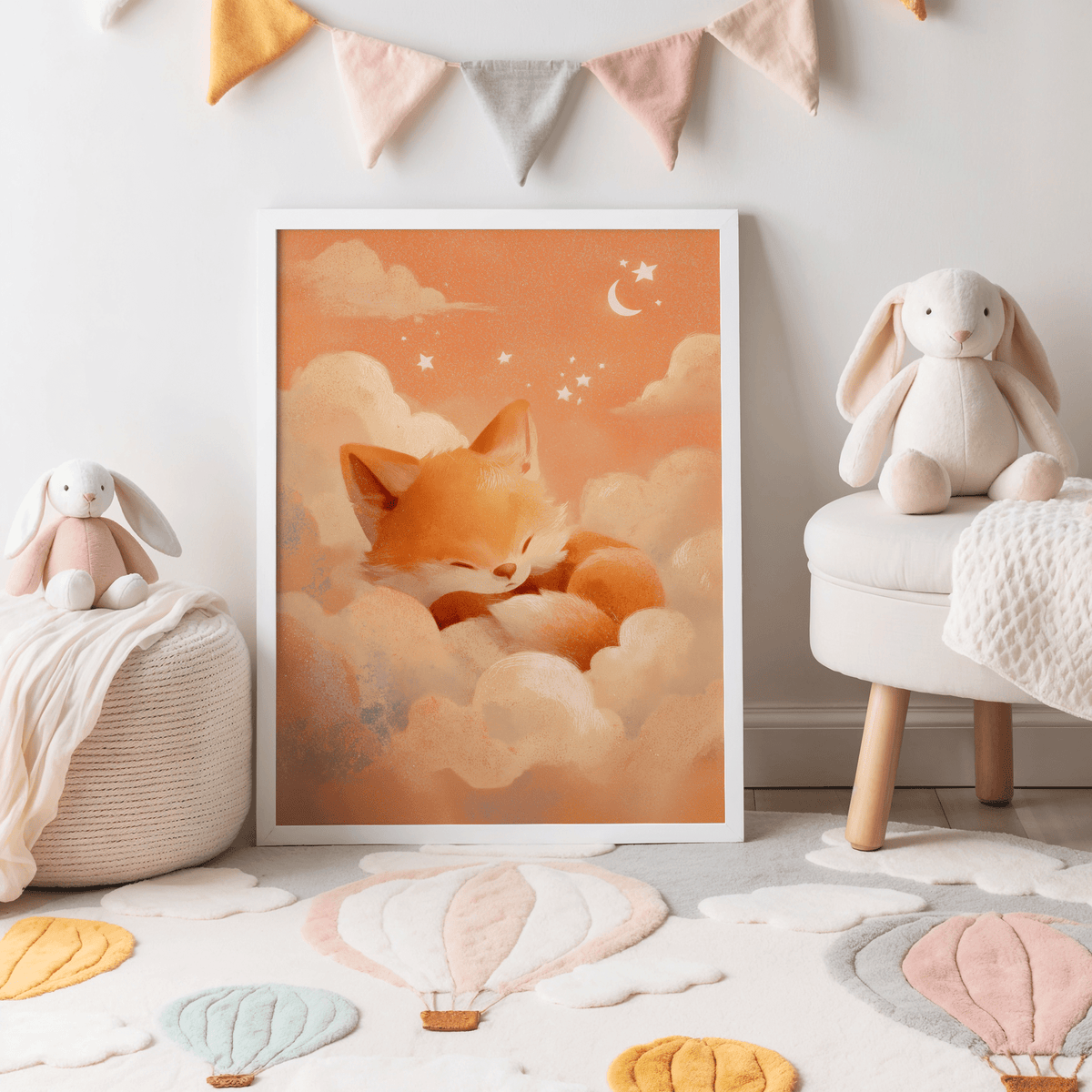 Sleeping Fox Art Print leaning against a wall in a nursery with soft toys and pastel bunting
