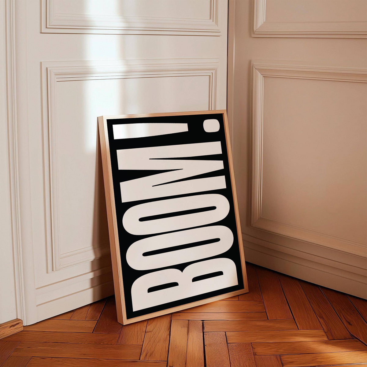 Modern Typography Wall Art leaning on wood parquet floor with cream panelled walls