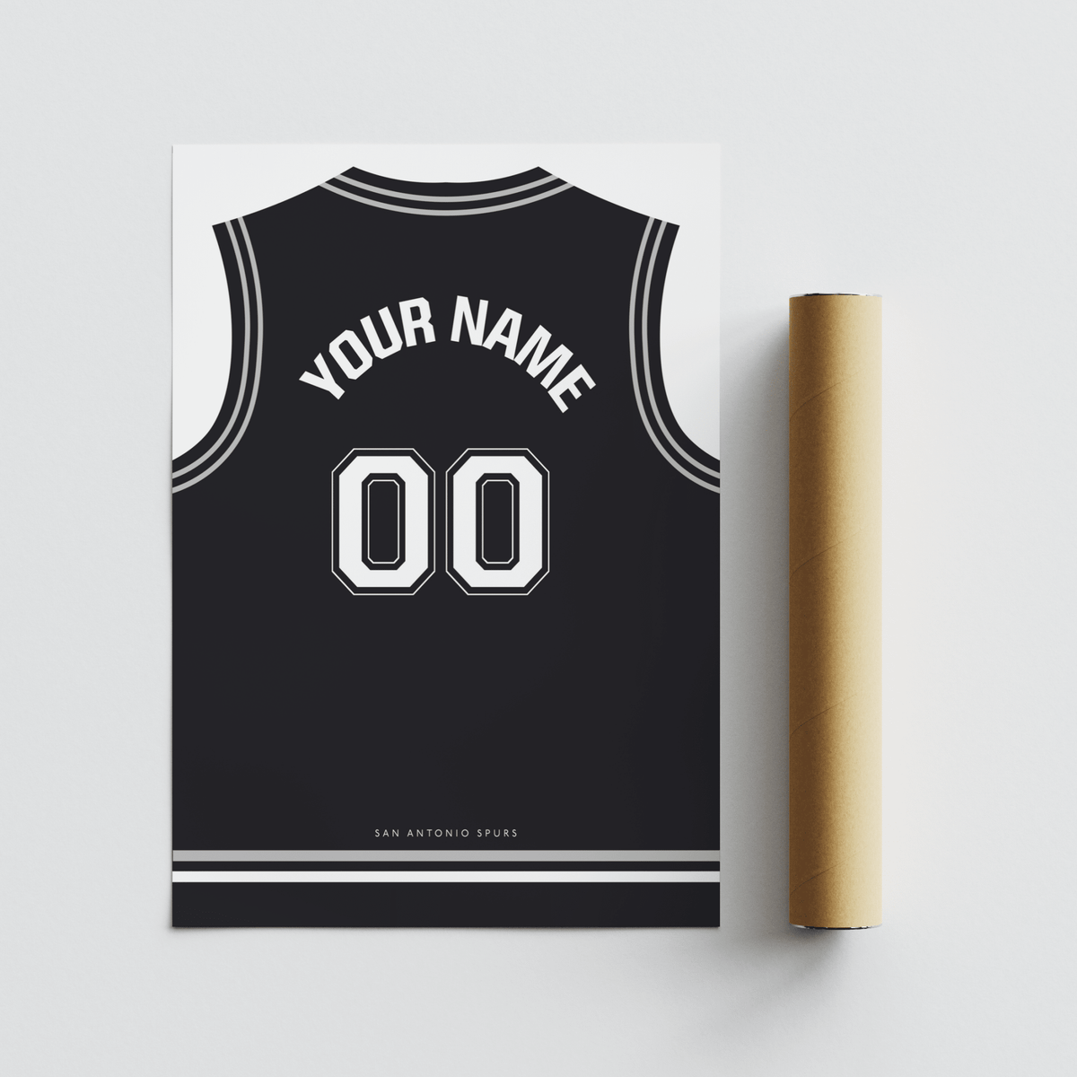 Detail close-up of Basketball Jersey Poster in Black with White Number next to a packaging tube