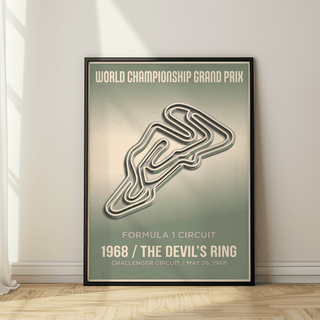 Framed vintage street circuit map poster in green and cream leaning on a wooden floor with wall shadow
