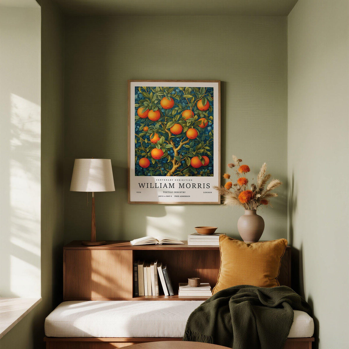 Orange Tree wall art with bright orange fruit and green leaves above a wooden sideboard with lamp and cushion