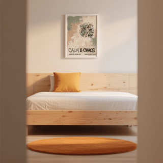 Urban Graffiti Art Print on bedroom wall above a wooden bed with an orange cushion and rug