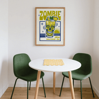 Zombie Cocktail Art Print in a small dining nook with green chairs and a round white table