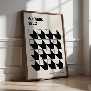 Office Space Poster leaning with black and white geometric shapes in wooden frame in sunlight