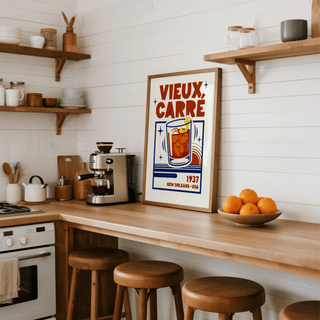 New Orleans Cocktail Print leaning on a kitchen worktop with oranges in a bowl nearby