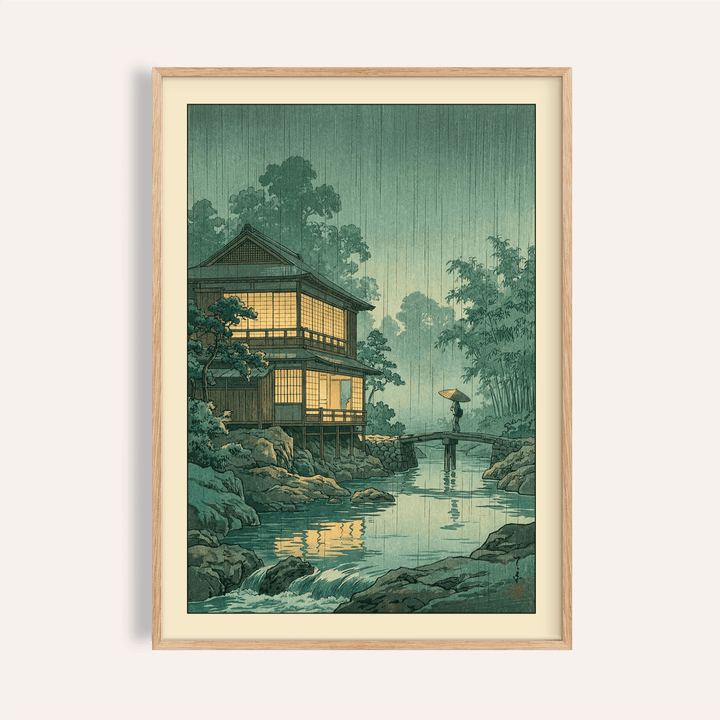 Framed print close-up of Japanese Landscape wall art showing a traditional house in rain with muted green and yellow tones