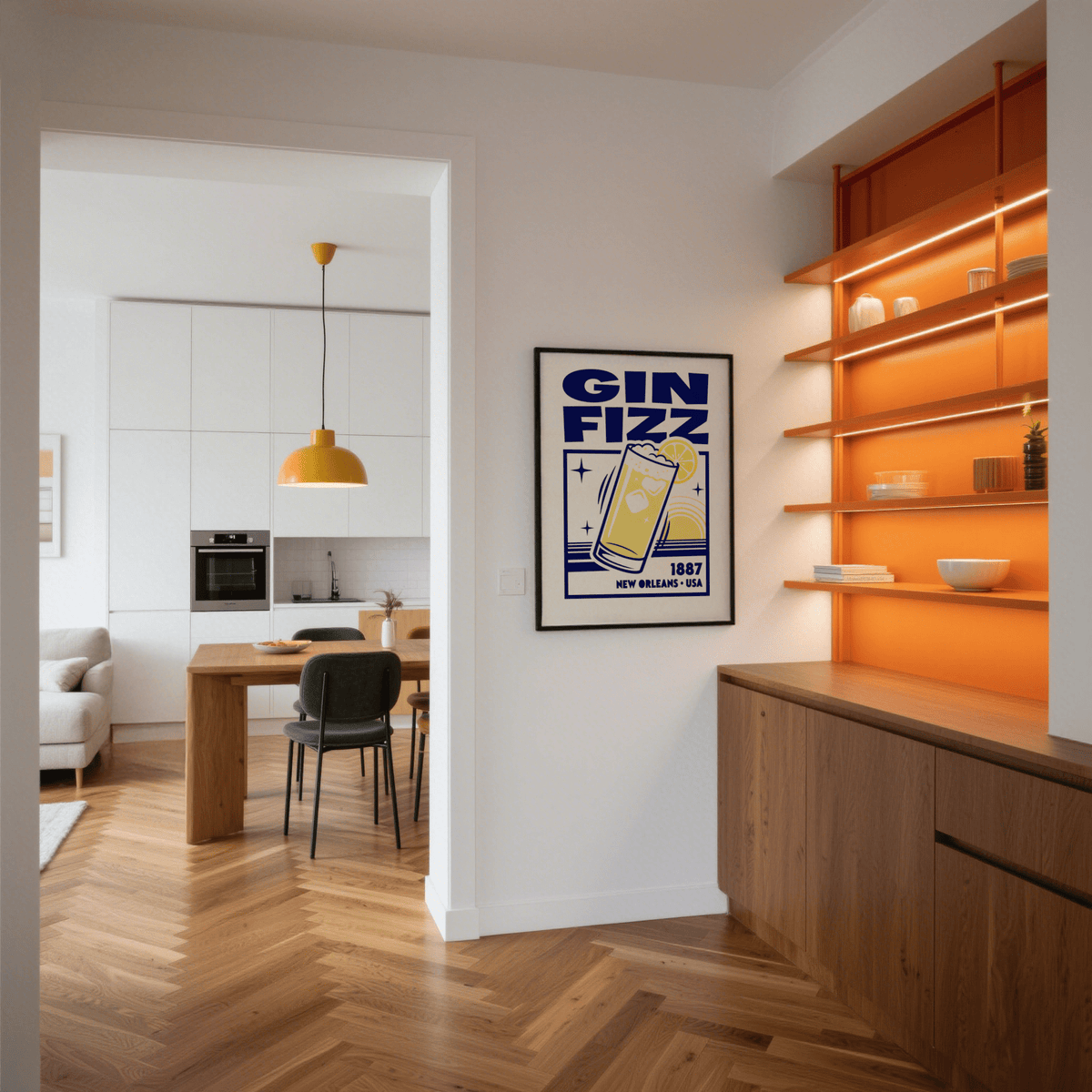Vintage Gin Fizz Print framed print on a white wall near orange shelves in a modern kitchen