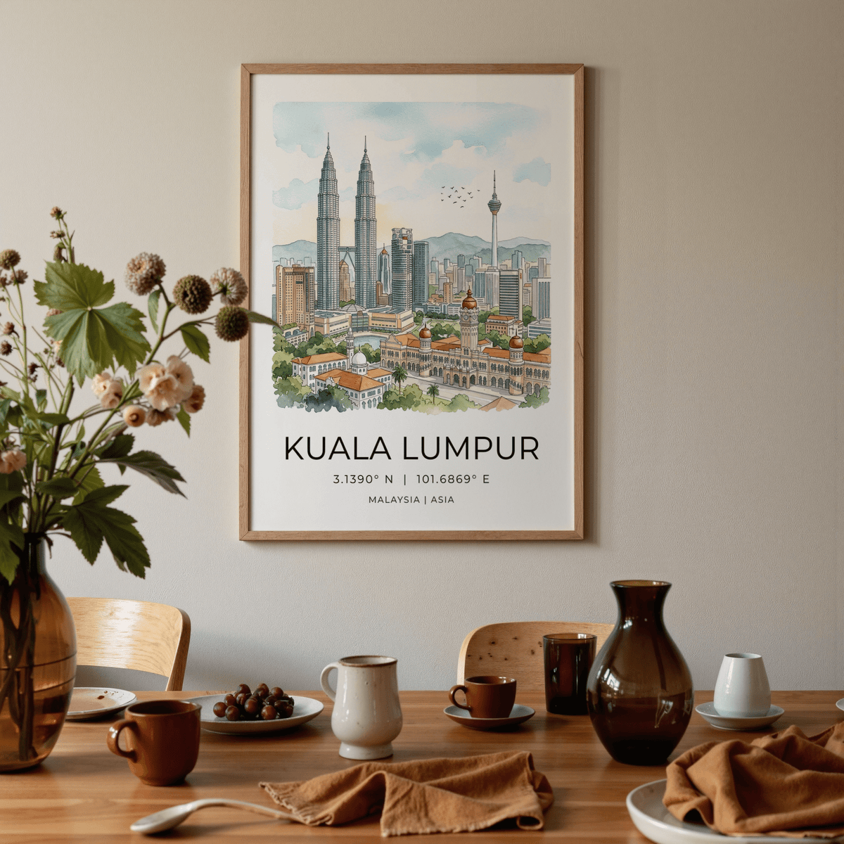 Kuala Lumpur art print in a dining room above a wooden table with crockery and a vase of flowers