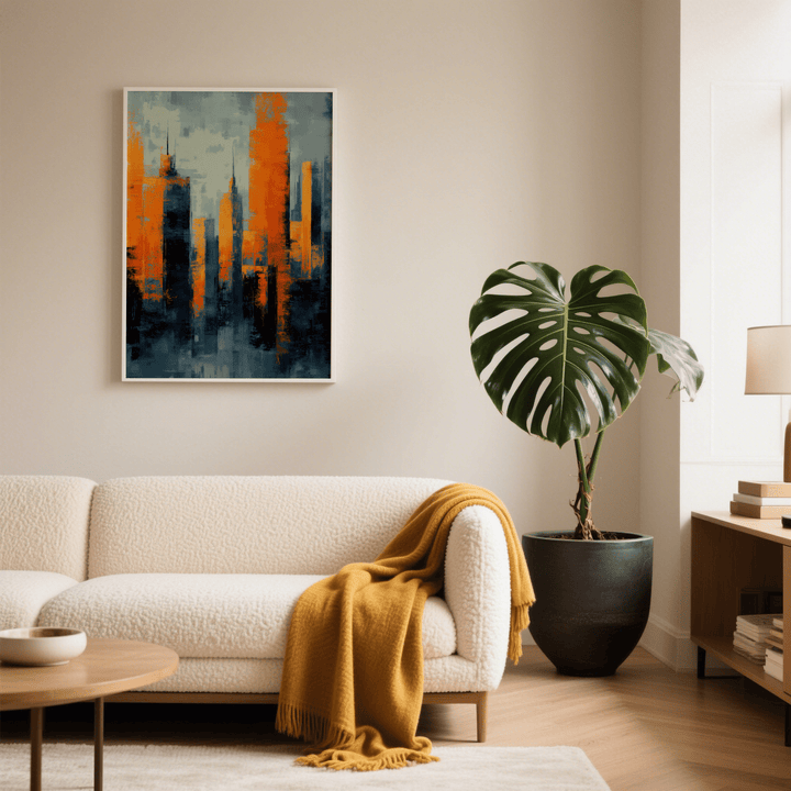 Contemporary Urban Art with abstract orange and blue skyscrapers on a wall above a sofa