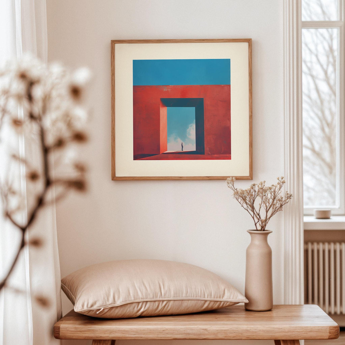 Abstract Surrealism Art framed print of person in geometric passage with blue and red tones above a beige cushion