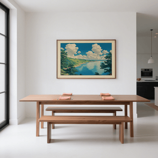 Hasui Kawase Seascape Print hanging above a wooden dining table with benches in a white dining room