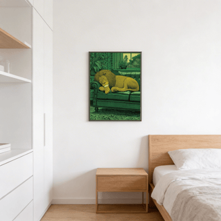 Sleeping Lion Print on a wall in a bedroom above a wooden bedside table with a light bed next to it