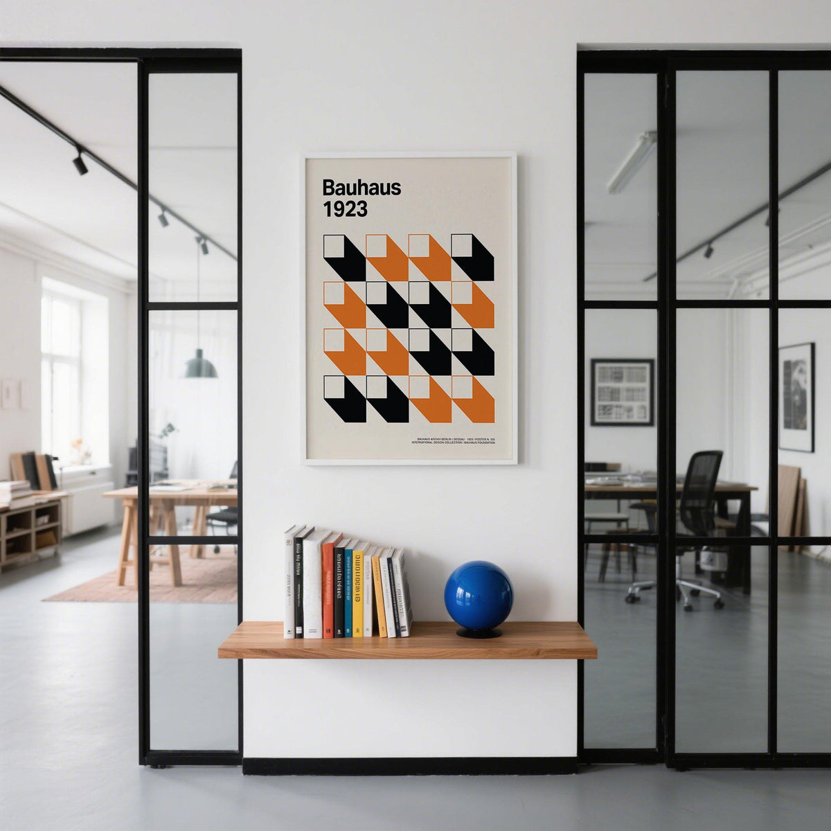 Artwork for Office wall art with an orange and black geometric grid above a shelf with books and a blue ball