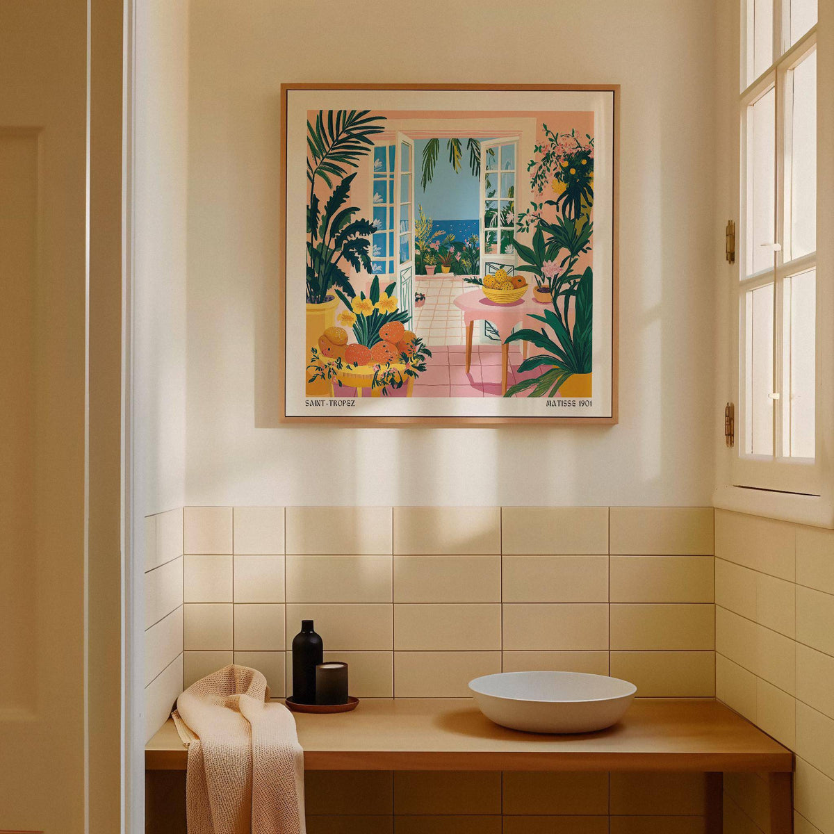 Coastal wall art of open doors with a sea view above a wooden shelf in a light tiled room