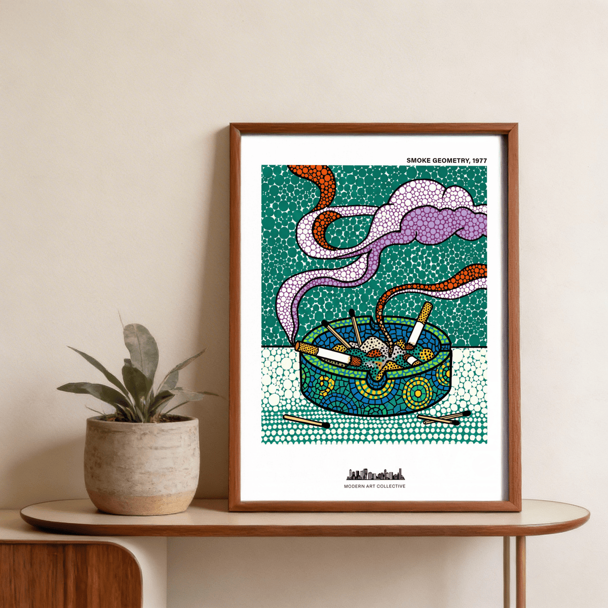 Framed Geometric Smoke Art Print with colourful ashtray and smoking cigarettes on a wooden table with potted plant