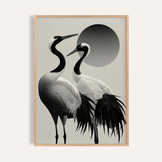 Framed close-up of black and white crane print showing two cranes with a large shaded circle