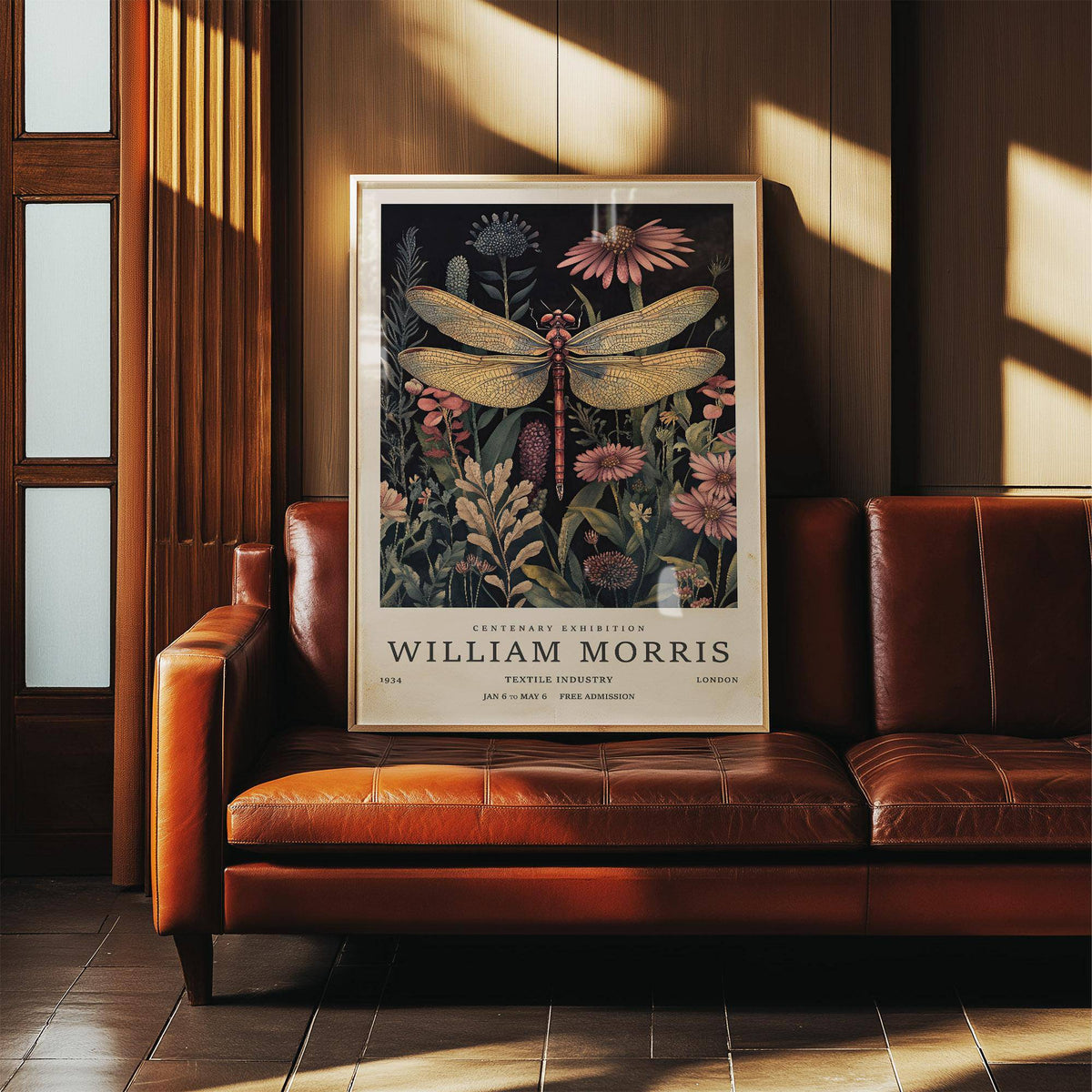 Dragonfly Art Prints framed print leaning on a brown leather sofa with warm lighting