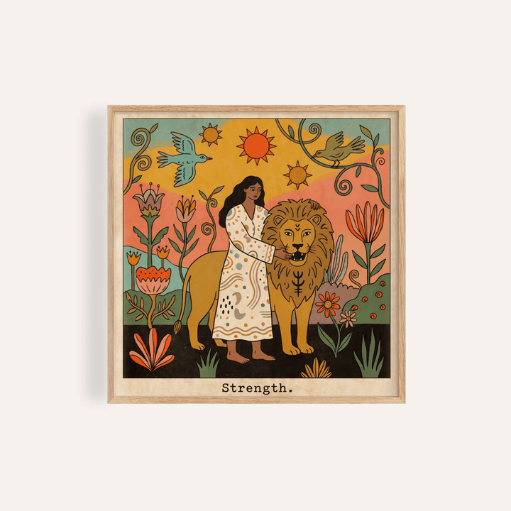 Framed print of Strength Tarot Card Art showing woman with lion with folk-art style and natural tones
