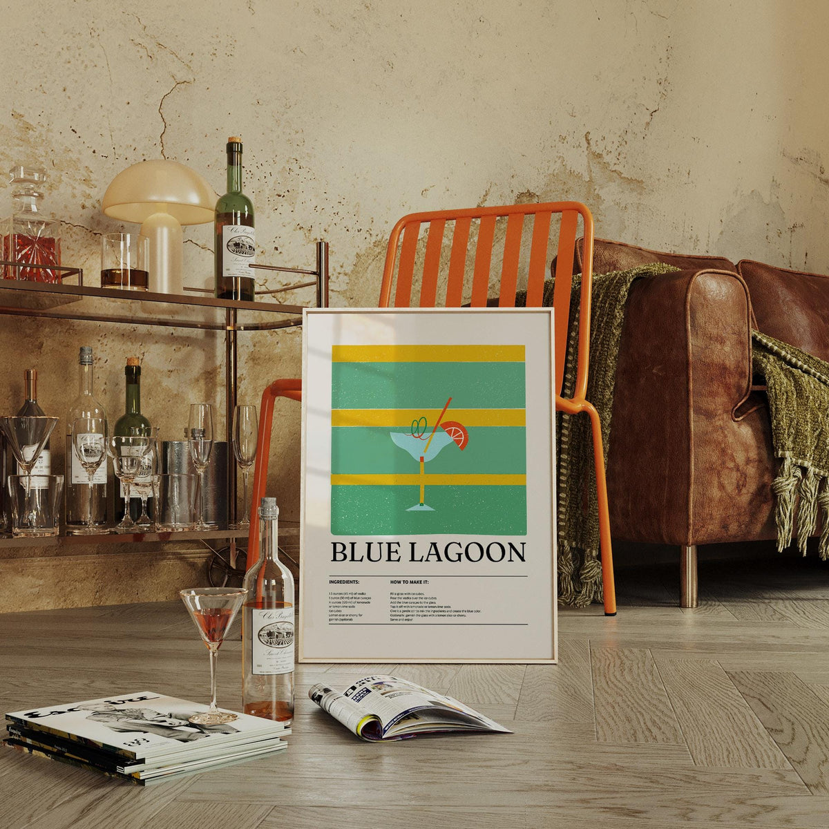 Print leaning on a chair of a blue lagoon cocktail in minimalist style next to a sofa