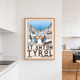 Print on a wall in a kitchen of St Anton Tyrol Art Print with a ski resort scene in blue and grey tones