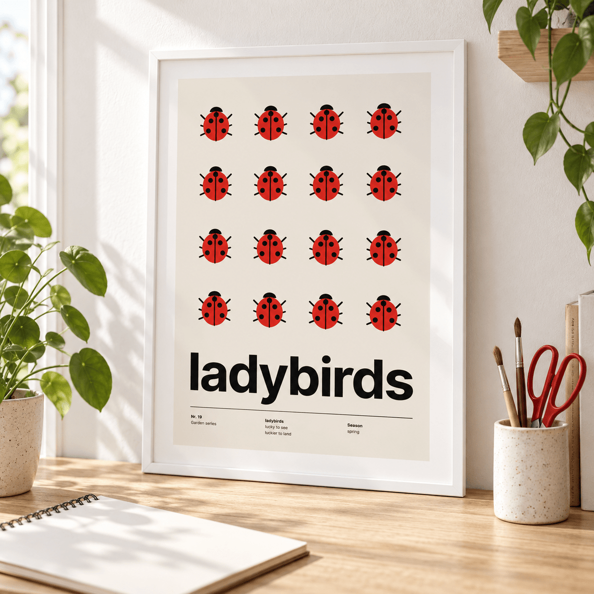 Ladybird poster in a light filled home studio