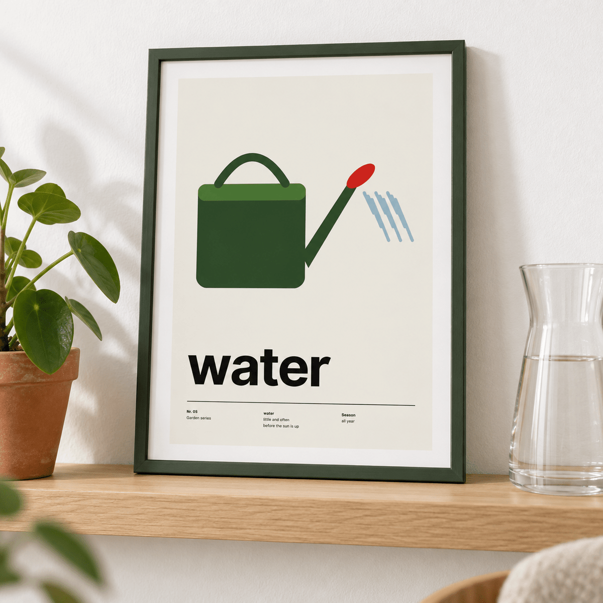 Watering can garden poster leaning on a shelf in a bright room