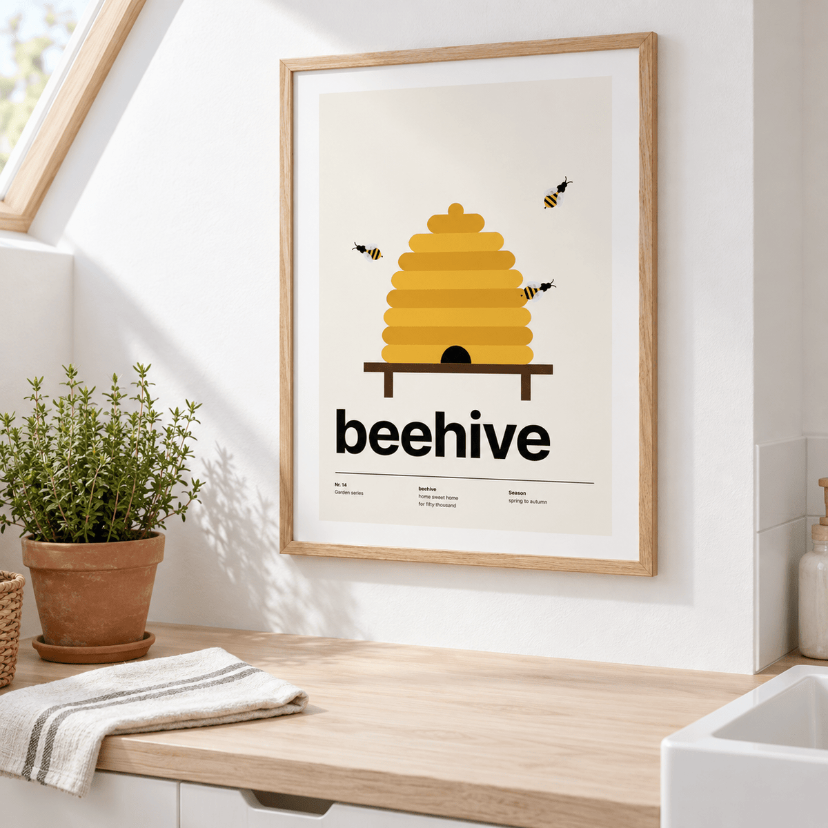 Beehive print above a kitchen counter by a window