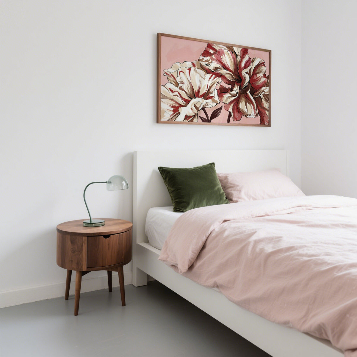 Pink Background Flower Print above a bed with pink bedding and green cushion in a bedroom