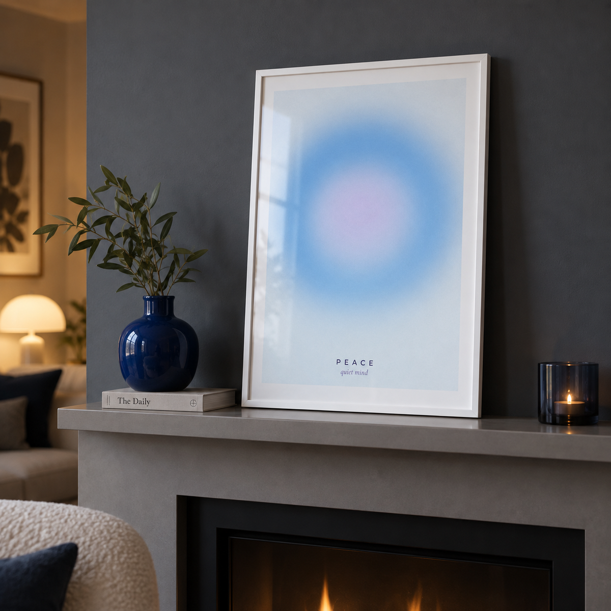 Pale blue and lilac aura print on a mantelpiece against a slate wall