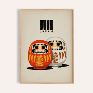 Framed Daruma Print of red and white dolls with Japan text on cream background
