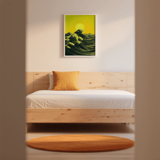 Abstract Ocean Art Print with green and yellow waves and sun above a wooden bed with orange cushion