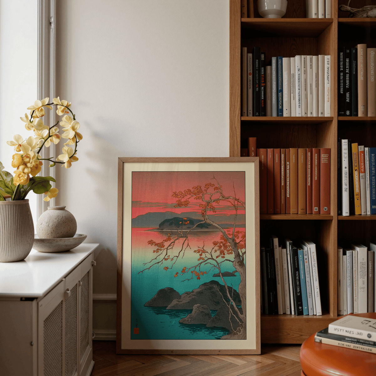 Hasui Kawase Maple Leaves Print leaning on a shelf near a bookshelf and a white window sill with flowerpot