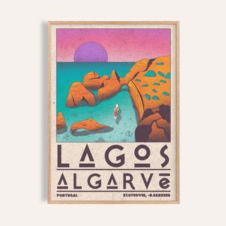 Framed Lagos Algarve wall art of a rocky coastal cove with retro style and purple sun