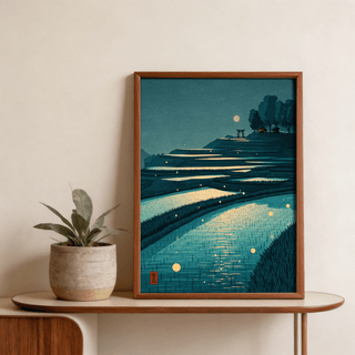 Framed Tranquil Rice Field Poster with blue and green terraced rice fields and yellow moonlight beside a plant on a table