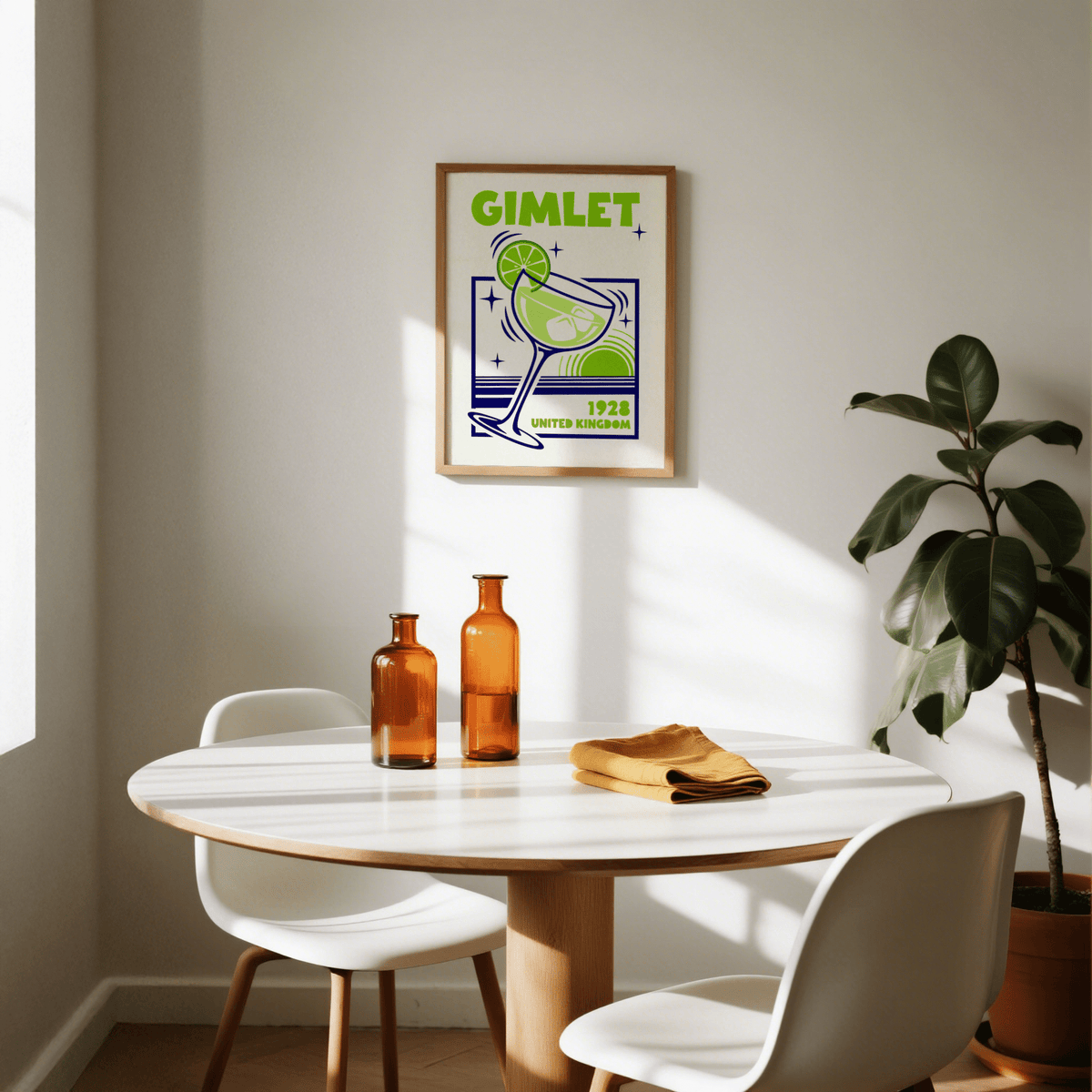 Gimlet Cocktail Poster on a white wall with green plant and amber bottles by a round table in sunlight