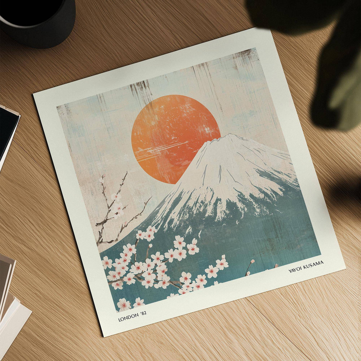 Square Print featuring Mount Fuji with cherry blossoms in soft orange and blue tones on a wooden surface