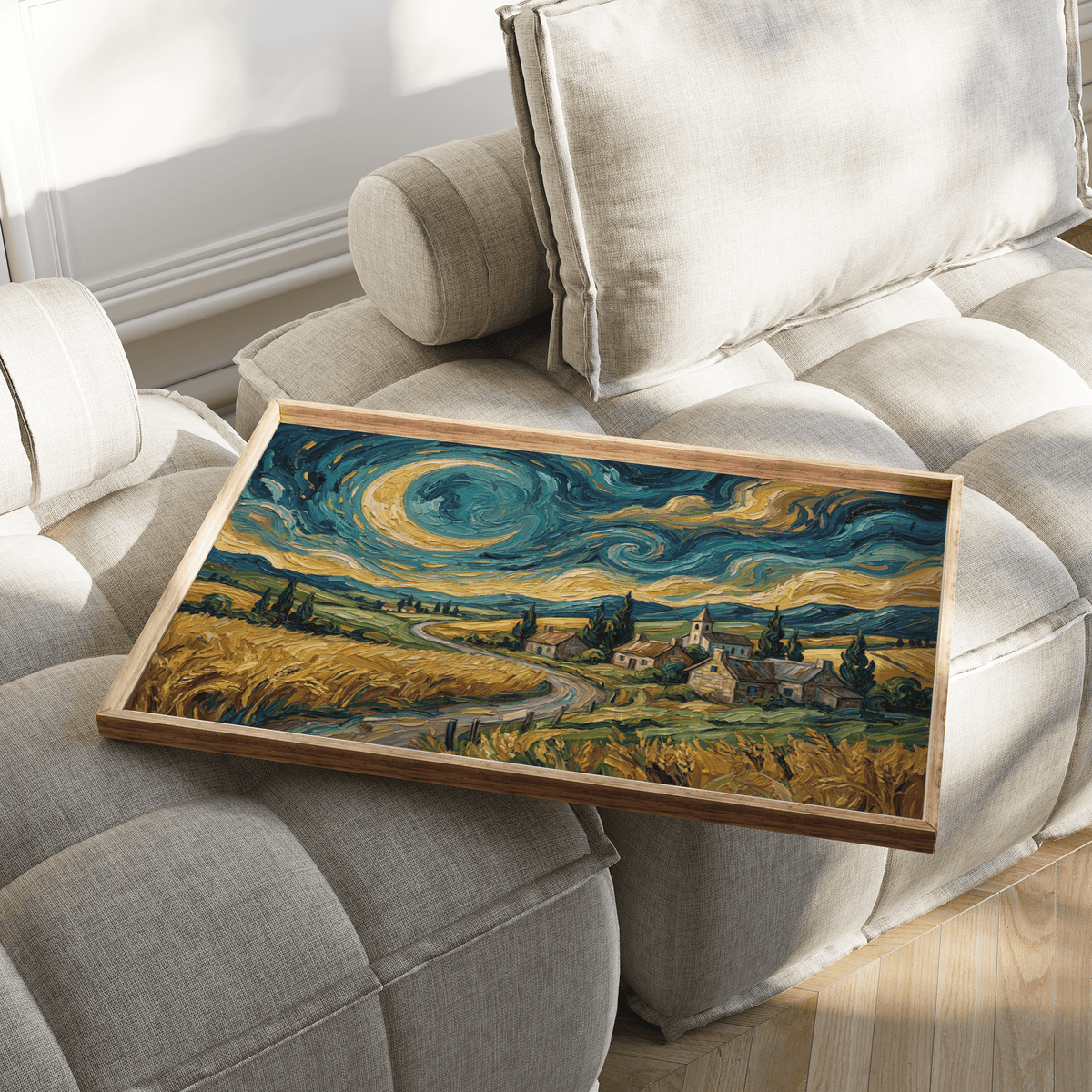 Swirling night village artwork on a serving tray with a wooden frame on a beige sofa