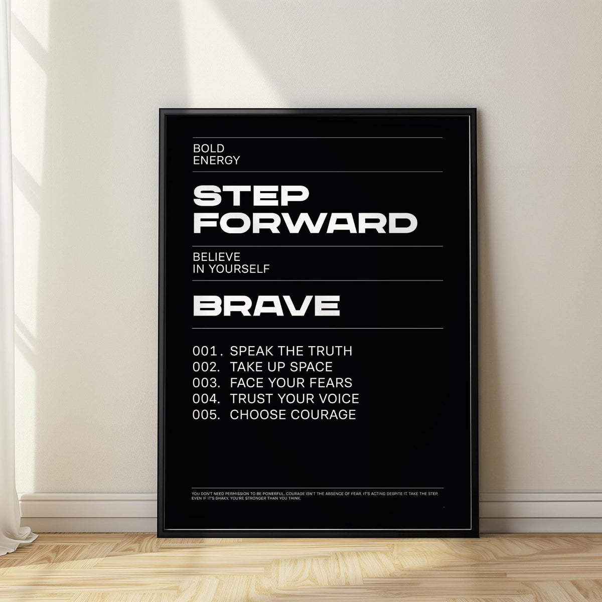 Positive Affirmation Prints wall art with white motivational text on a black background leaning on a light wooden floor with sunlight