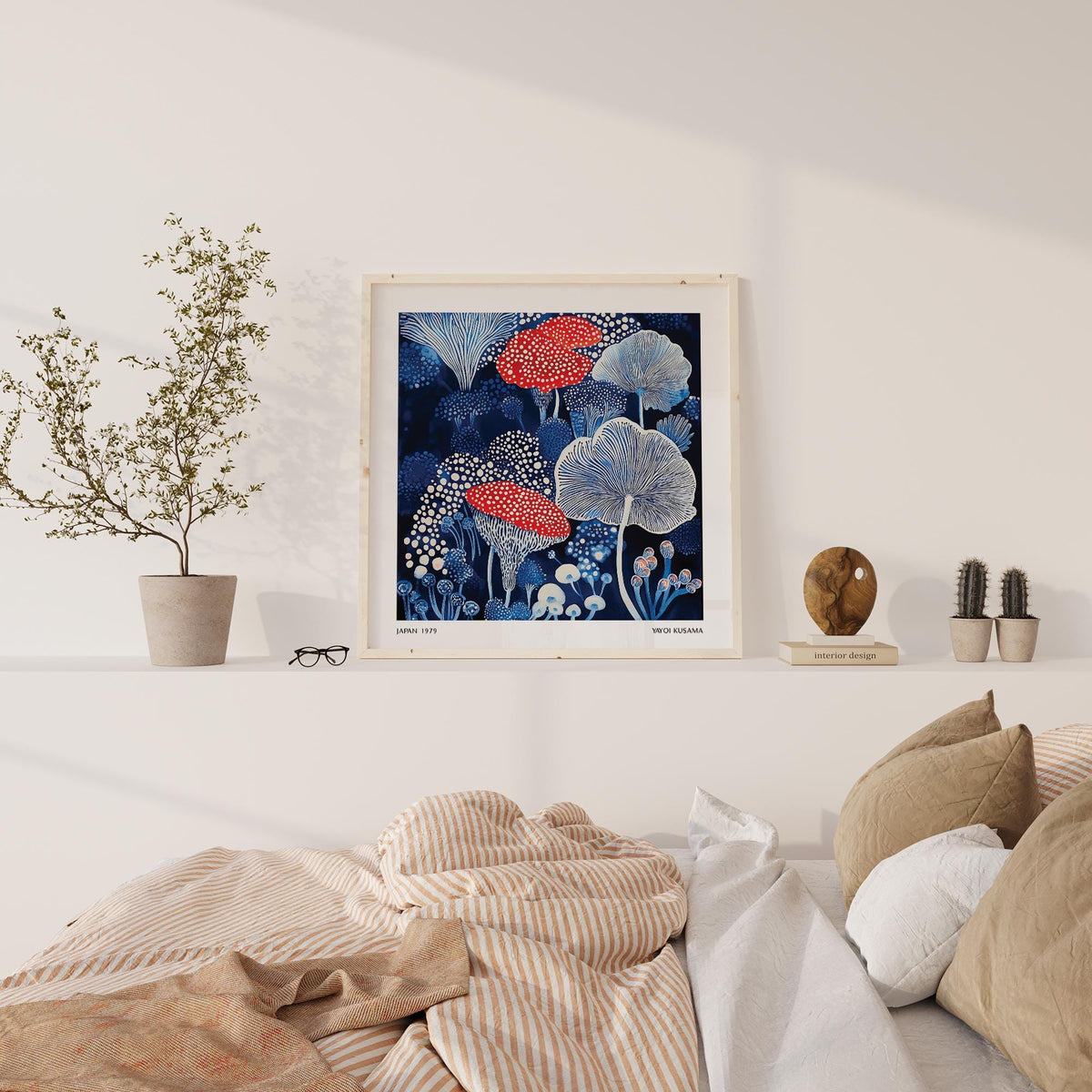Mushroom Poster print on a wall above a bed with plants and cushions in natural light