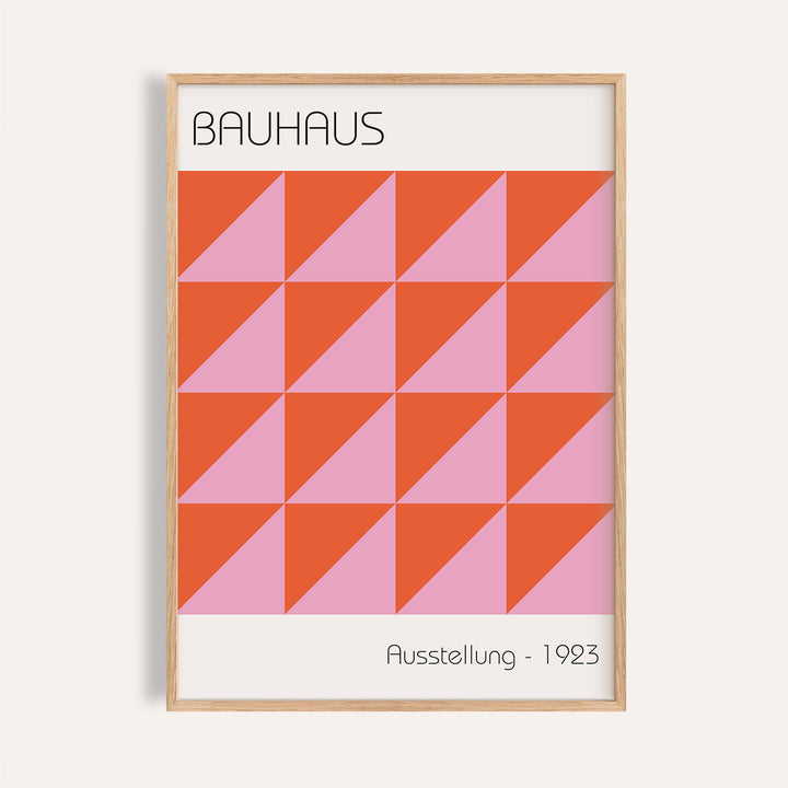 Framed Modern Wall Art featuring red and pink geometric triangles with text bauhaus