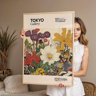 Framed Japanese Flower Painting held by a woman with detailed floral illustration in earthy colours