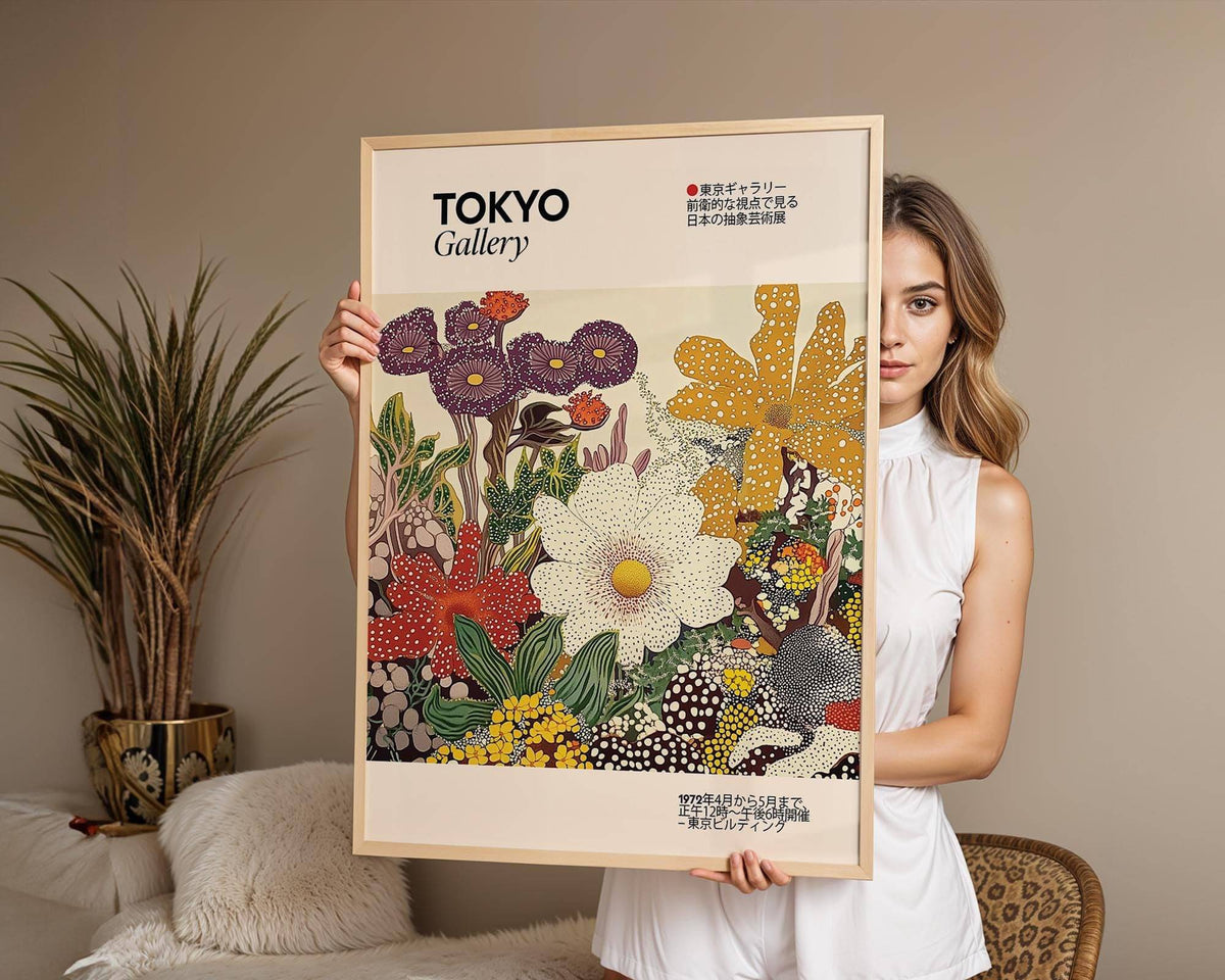 Framed Japanese Flower Painting held by a woman with detailed floral illustration in earthy colours