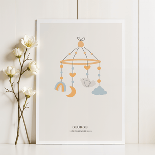 Personalised Baby Poster print leaning on a white wooden wall with white flowers beside it