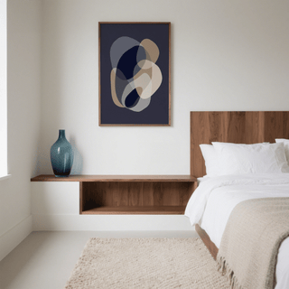 Prints Abstract Art framed print of abstract organic shapes in blue grey beige above a wooden shelf with a blue glass vase in bedroom