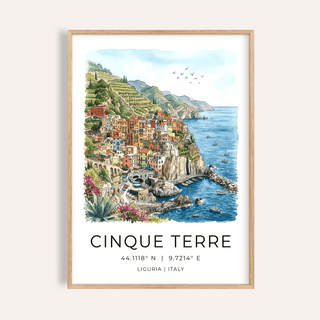 Framed print of Cinque Terre with colourful houses by the sea and a blue sky