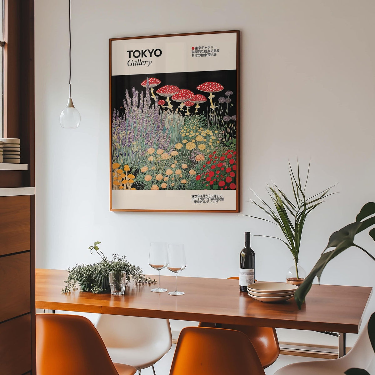 Floral Prints Vintage print of red spotted mushrooms hanging above a dining table with wine and glasses