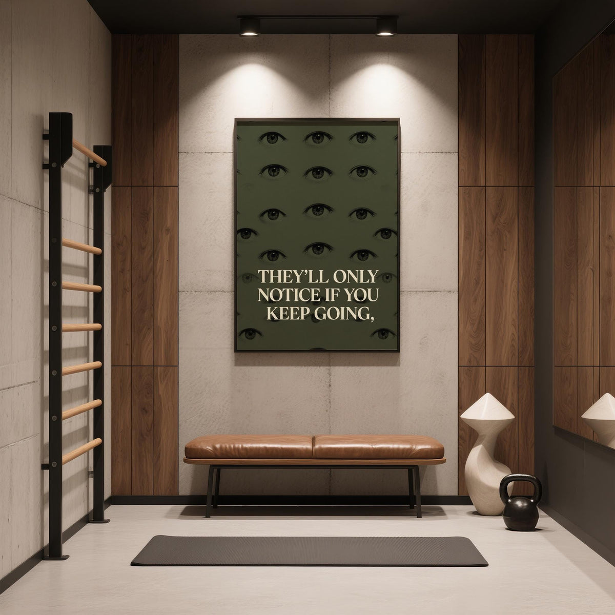 Gym Artwork print with human eyes and motivational text in black and olive green in a gym room with bench