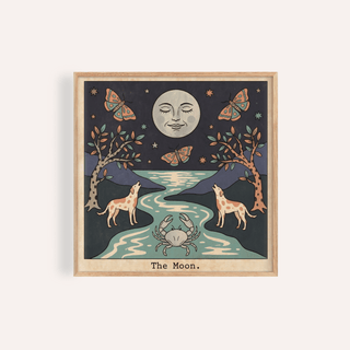 Framed print close-up of The Moon Tarot Card Art showing a moon with face and animals in folk-art style