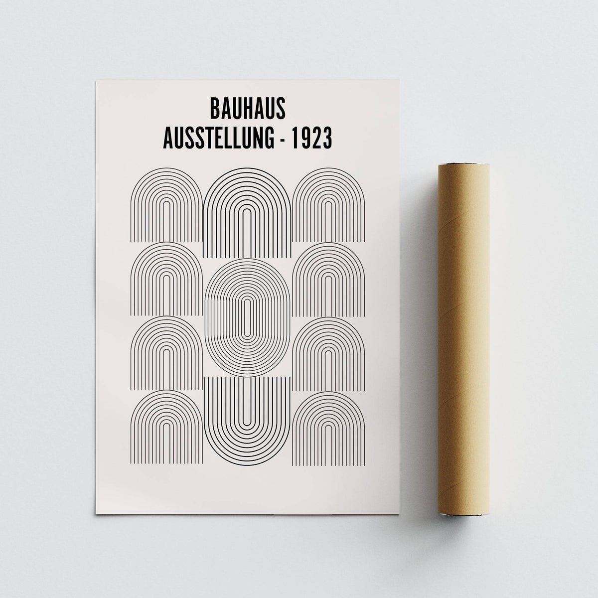 Bauhaus Minimalism Art print with black line arches displayed next to a brown packaging tube