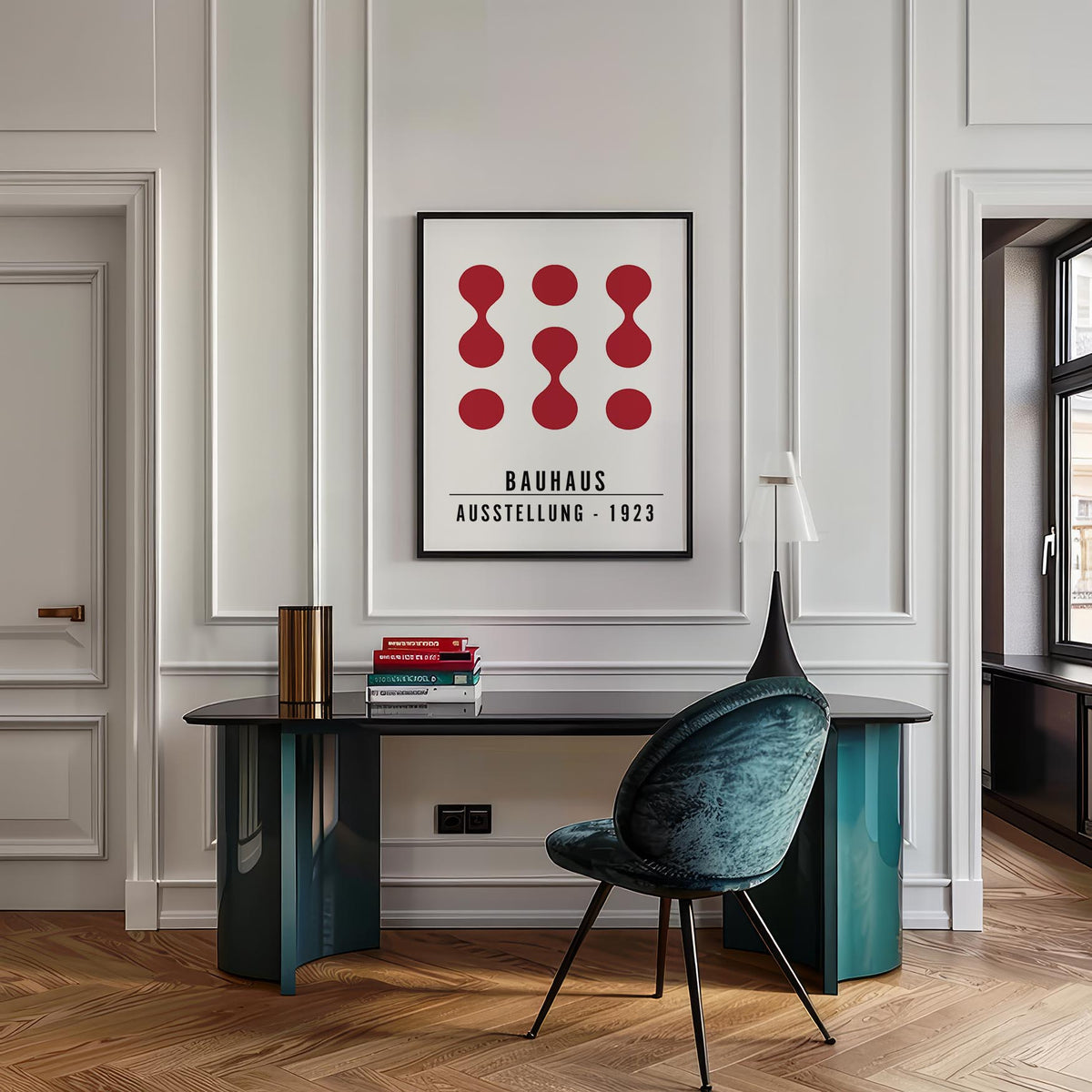 Artwork for Office Walls above a dark desk with abstract red shapes and text in a minimalist stylish office